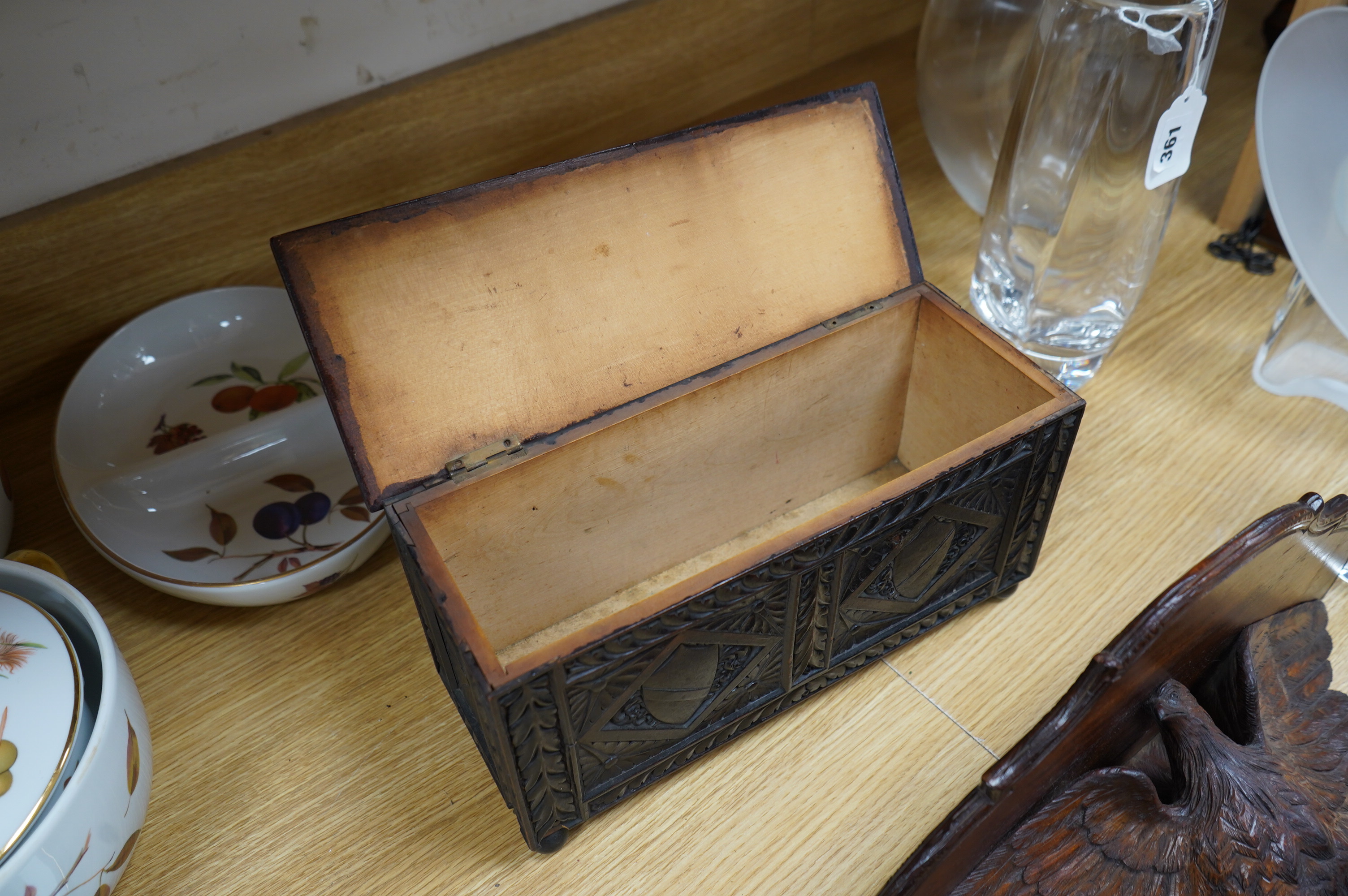 A late 19th century carved walnut and beech eagle wall bracket and a miniature coffer, largest 37cm wide. Condition - fair